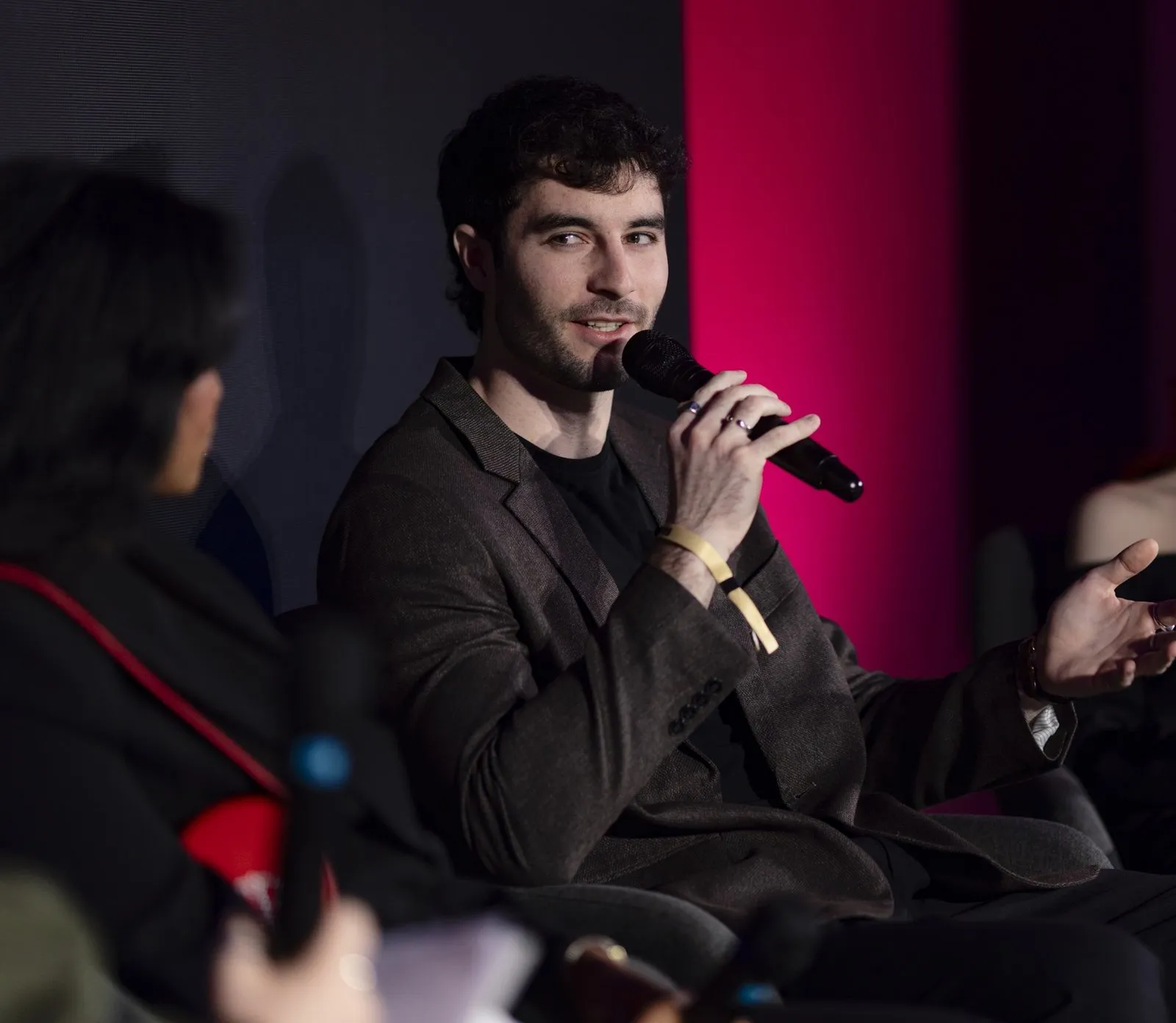 dr. Áron Balázs in a panel discussion at the Forbes Under 30 Summit